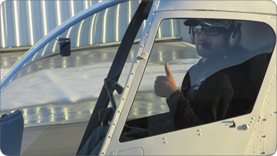 Student taking an introductory helicopter flight with Alpine Aviation